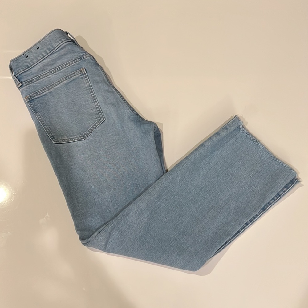 GAP classic five-pocket jean, light blue wash, flattering raw hem kick fit
